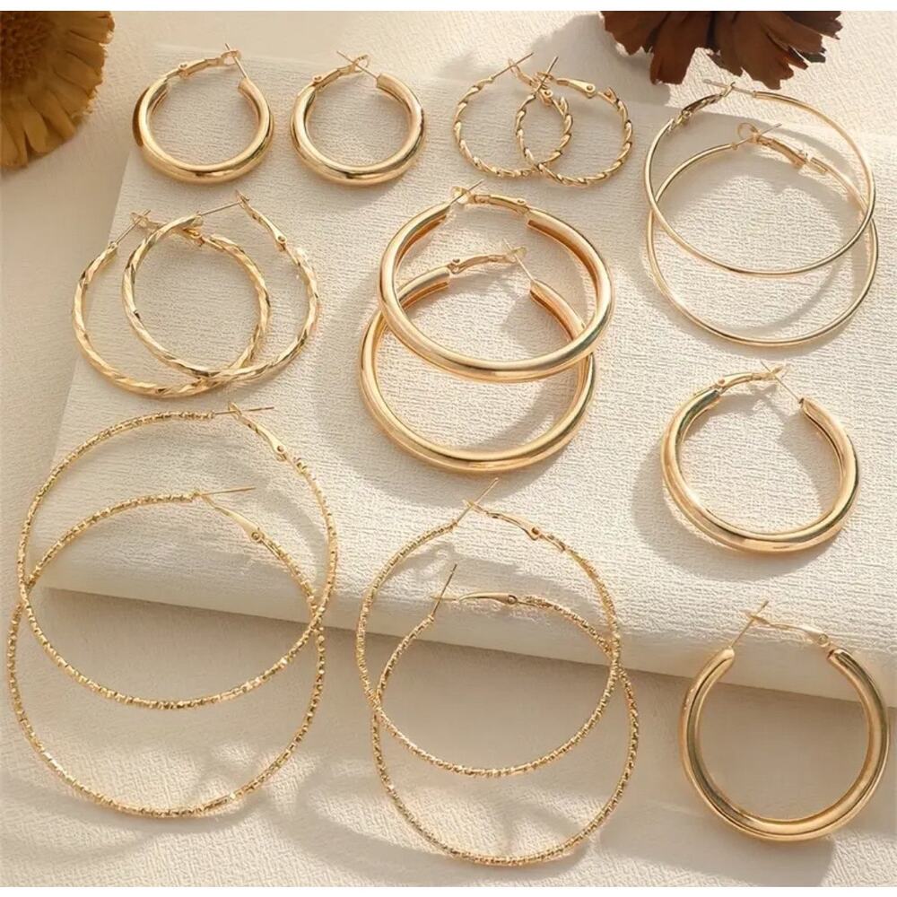 Set Of 8 Pairs Of Simple And Stylish Twisted Wave Sparkling Earrings